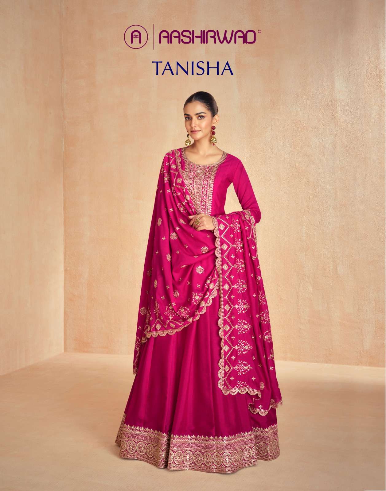 aashirwad creation tanisha 10099-10103 series designer premium silk free size long gown wholesale dealer surat 