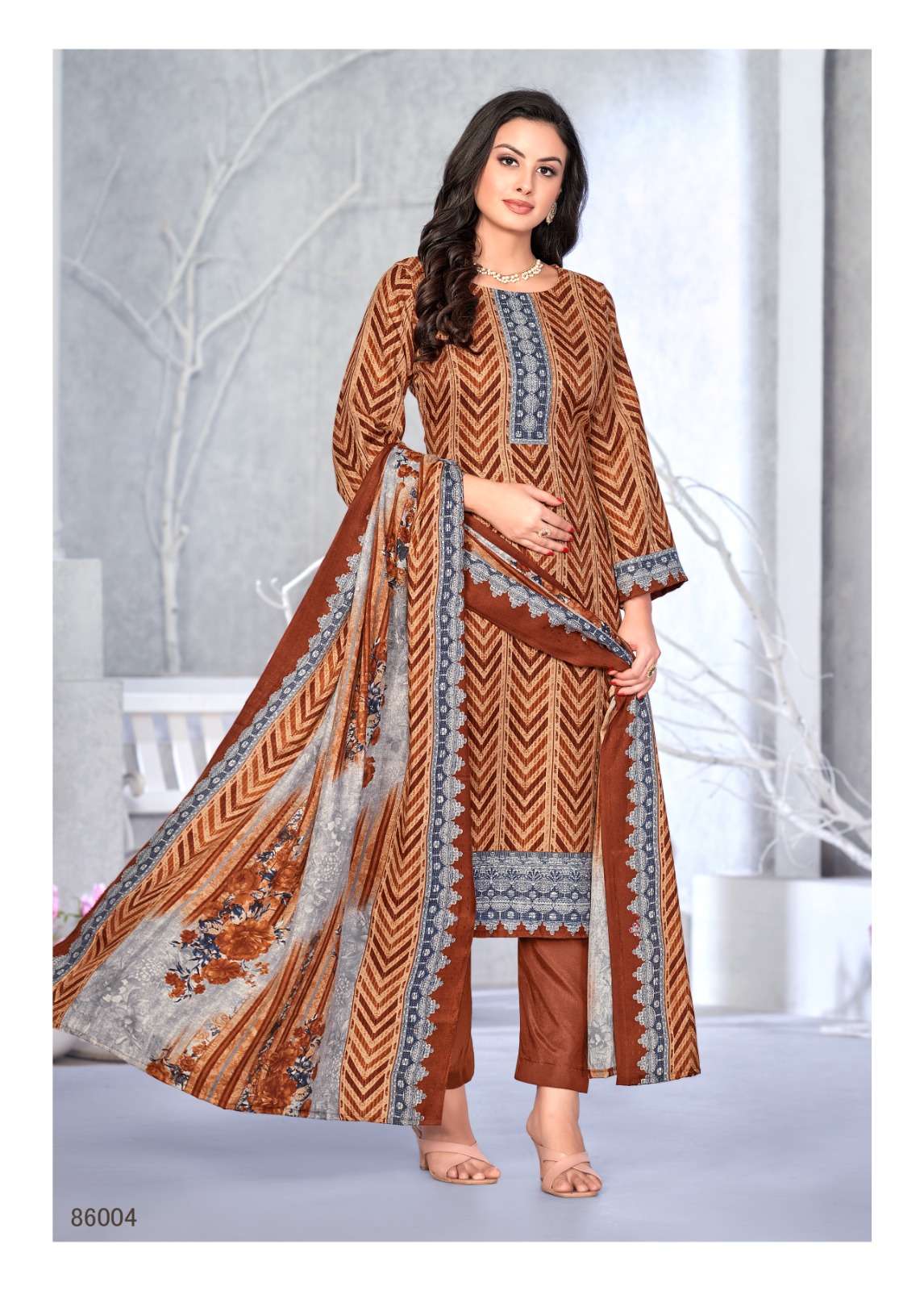 skt suits woolen queen 86001-86008 series latest festivewear designer salwar kameez wholesaler surat gujarat